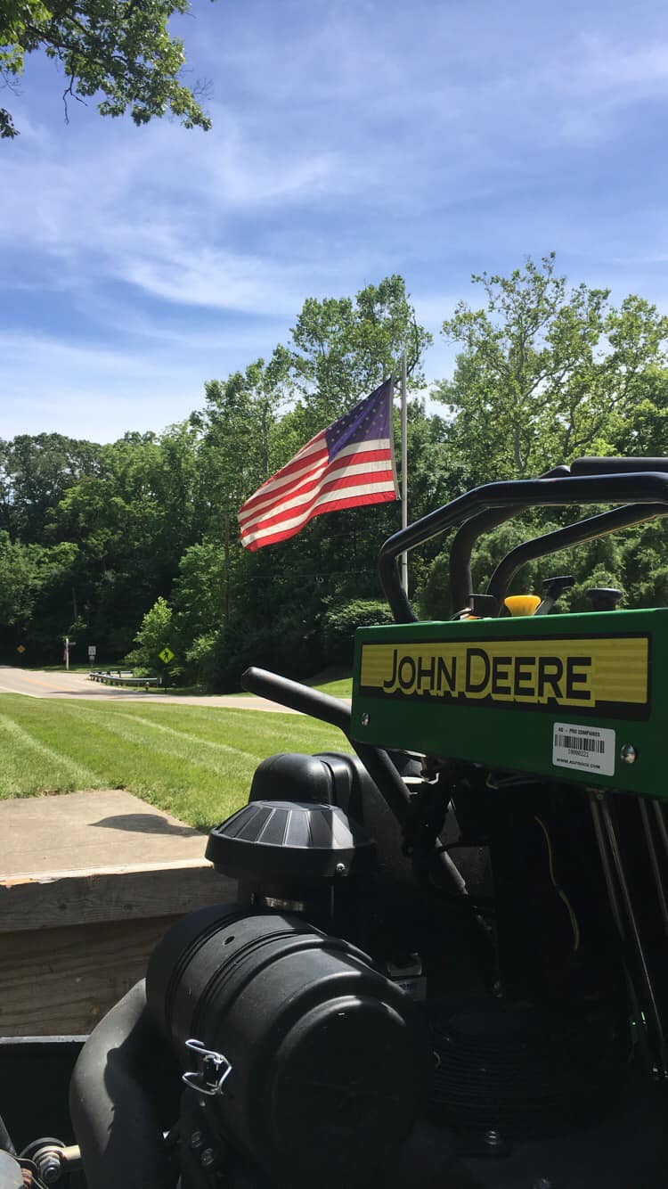 Cross Cutt - John Deere mower with American flag