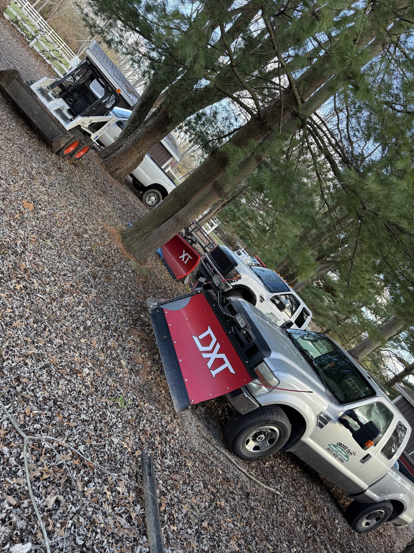 Truck with snow plow and gravel hauling